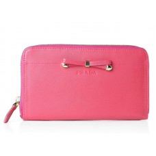 Prada Saffiano Zippy portemonnee met strikdetail, felroze