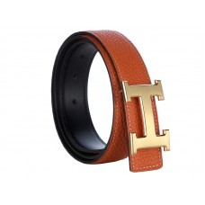 Hermes Togo leren brede riem met gouden H-gesp in baksteenkleur.