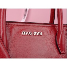 Miu Miu leren draagtas met glazuurafwerking, rood